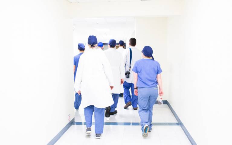 Doctors walking down a hospital corridor