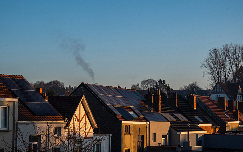 House roofs with solar panels. Image credit: Marianne Rixhon, Pexels