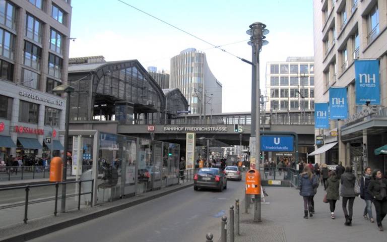 Berlin Transport Hub building with cars driving past the front