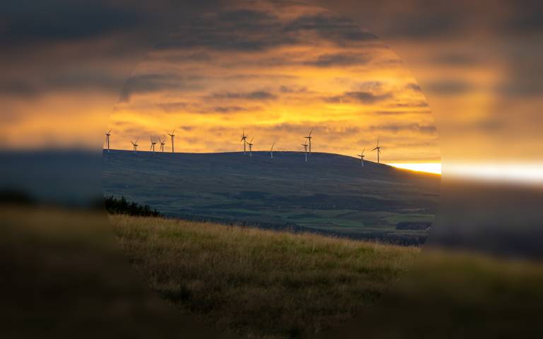 Wind turbines sunset with blur