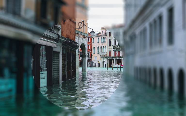 A flooded city - Photo by Nastya Dulhiier on Unsplash