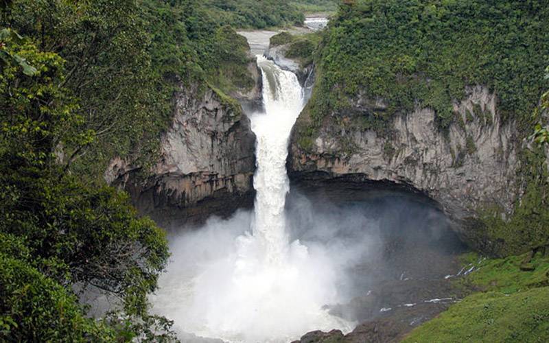 An arial view of a large, powerful waterfall