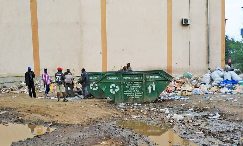 A large recycling bin