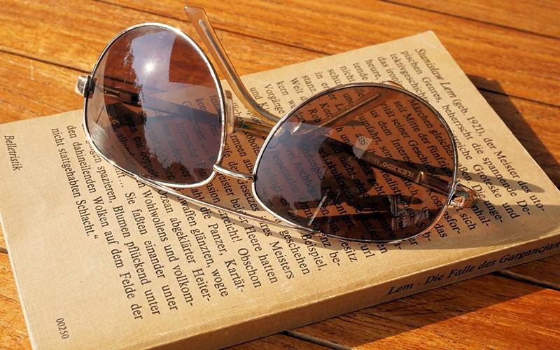 sunglasses on book
