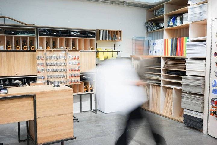 blurred image of person in workshop type space