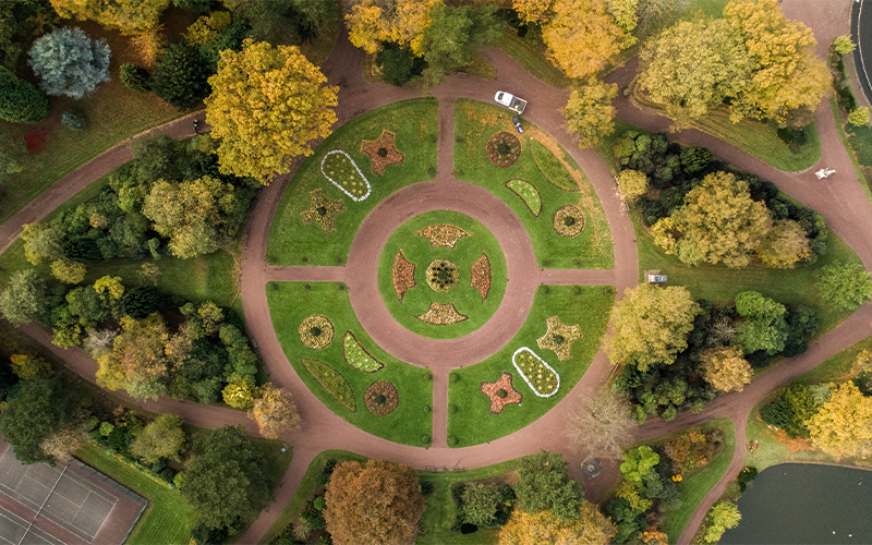 View from above of a park with a circular lawn in the middle