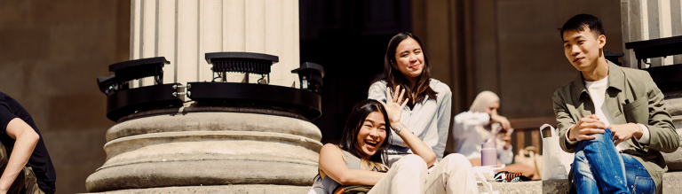 Students relaxing on the UCL Portico