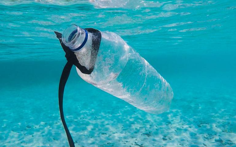 A plastic bottle in the ocean