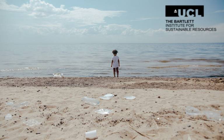 Image of boy on rubbish-strewn beach