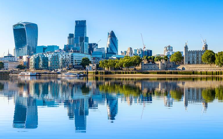 Photograph of London City and the Tower of London taken from across the river on a bright summers day