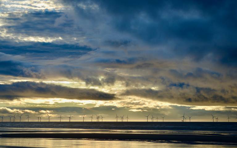 Offshore wind turbines with dramatic sky