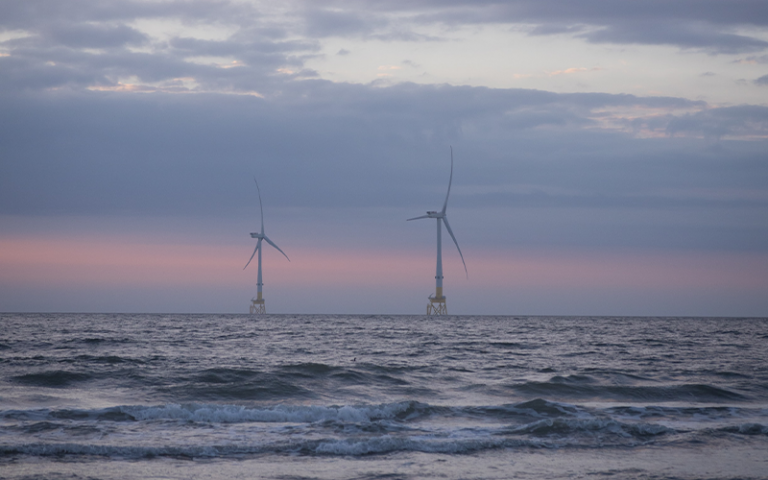 Two wind turbines in the north sea