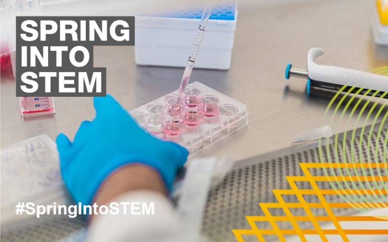 Spring into STEM hand with pipette and tray