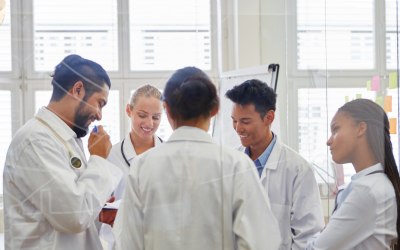 group of students in white lab coats