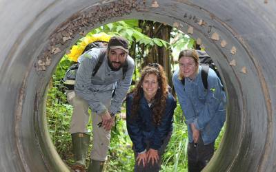 students in a curved enclosure