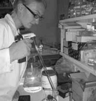 black and white student in lab
