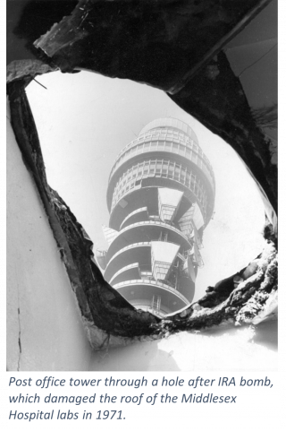 Damage in laboratory after a bomb, and view of the BT Tower through the hole in the roof.