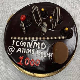 Celebratory cake for AIIMS recruitment of 1,000th patient to ICGNMD