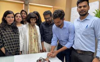 AIIMS team cut cake to celebrate recruitment of 1,000th patient to ICGNMD