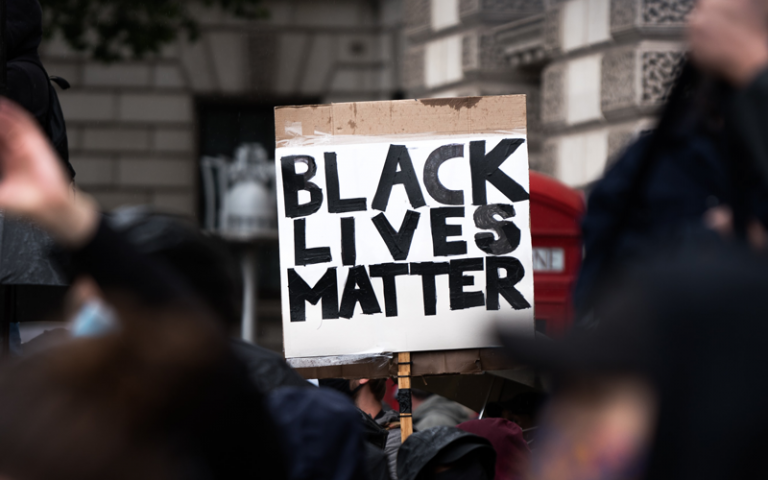 An image of a Black Lives Matter sign displayed at a protest