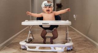 echild baby in play frame