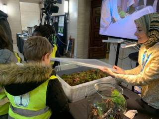Using micro-gardens to engage with school children to explain how data is used to study their health. The micro gardens helped to capture their attention.