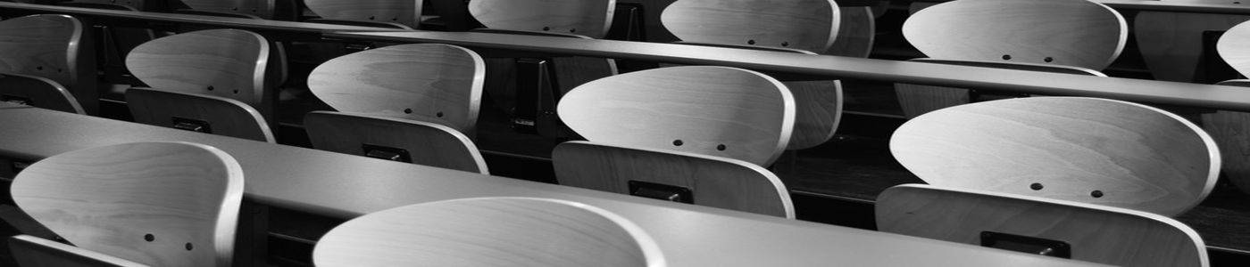 Row of Grey Chairs in Lecture Theatre