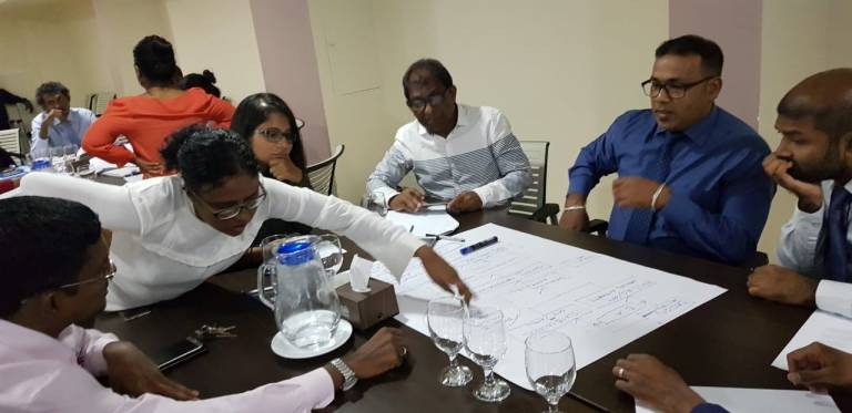 Participants of the Maldives building regulations' workshop in discussion 