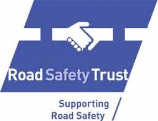 Road Safety Trust logo showing two hands in a handshake.