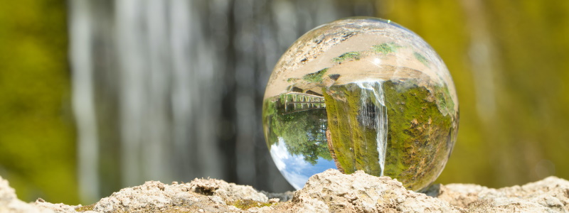 glass sphere reflecting nature - Unsplash Marc Schulte