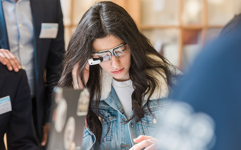 Student wearing holo lens glasses