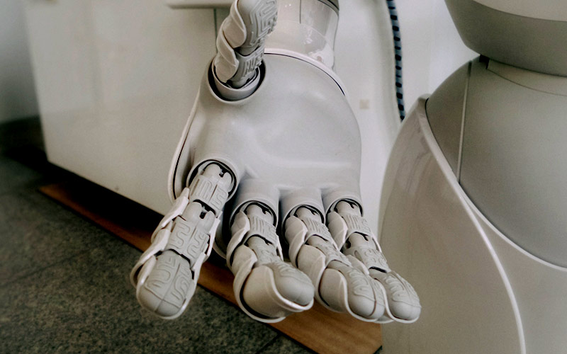 A close-up of a robot's hands, outstretched