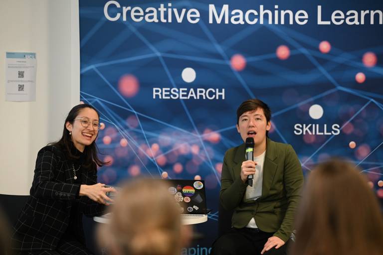 Two women speaking at AI Fringe Event 