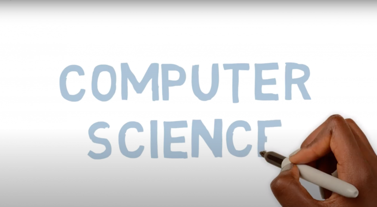 hand writing the words 'computer science' on a screen