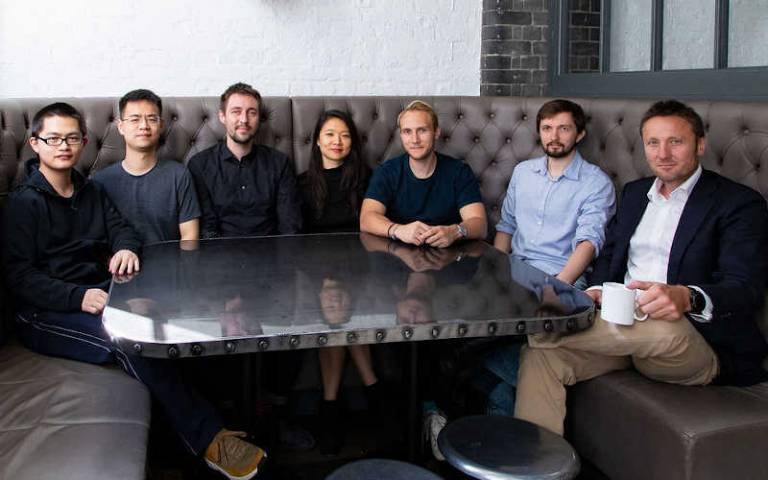 7 Rahko team members sitting at a table