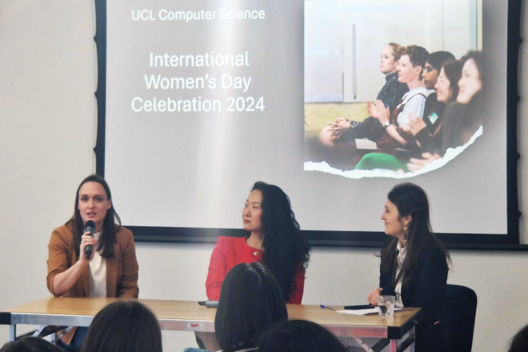 Three women holding microphones talking at the UCL Computer Science International Women's Day event