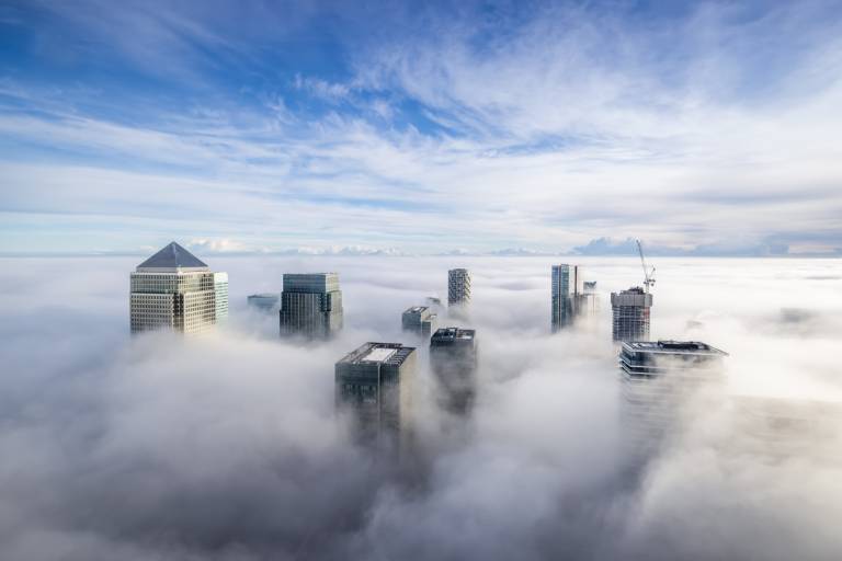 Photo of Canary Wharf, London, from above the clouds