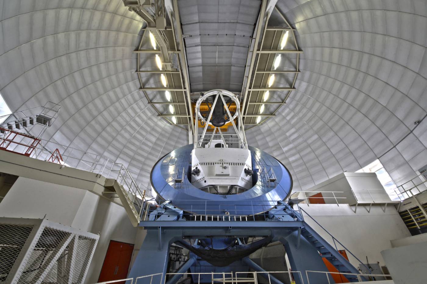 A wide-angle view of the NOAO Mayall 4-meter telescope on Kitt Peak National Observatory, P. Marenfeld & NOAO/AURA/NSF…