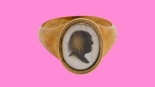 Jeremy Bentham ring on pink background