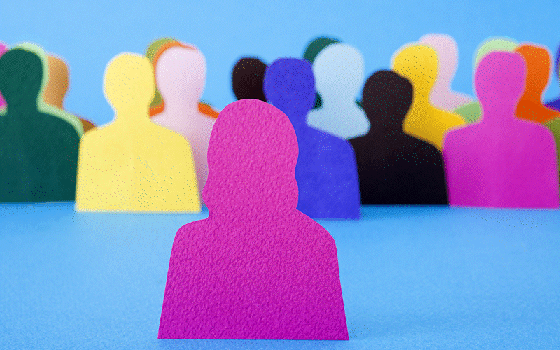 Frequently Asked Questions FAQ Teaser Animation - Cut out colourful paper silhouette people with pop up speech bubbles 