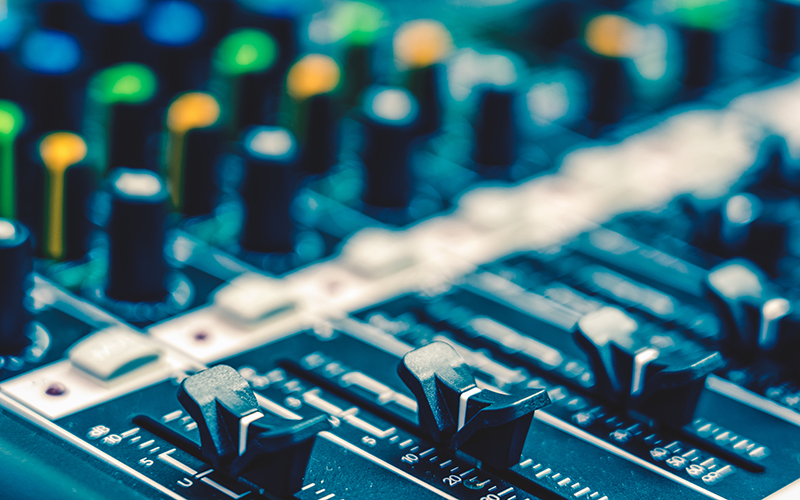 Film, Video and Audio Production Teaser - Faders on audio mixing desk