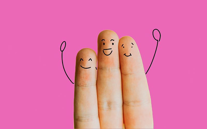 Group Photography Teaser - Three fingers with smiley faces drawn on