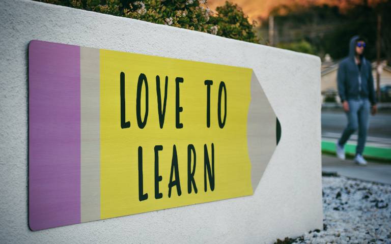 Sign that says love to learn