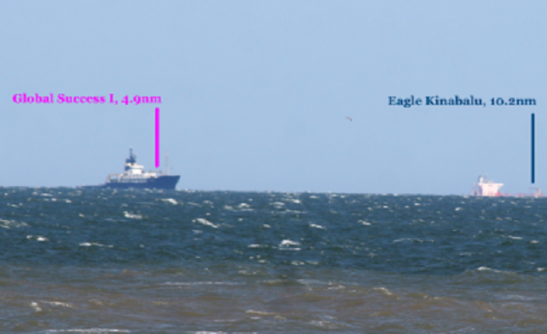 Image of two ships at sea. The whole of the ship on the left is visible where only the top half of the ship on the right is visible. Text says from left to right: 'Global Success I, 4.9nm' and 'Eagle Kinabulu, 10.2nm'