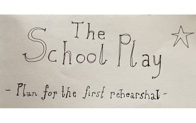 Handwritten text: The School Play. Plan for the first rehearsal. with a small star in the top corner.