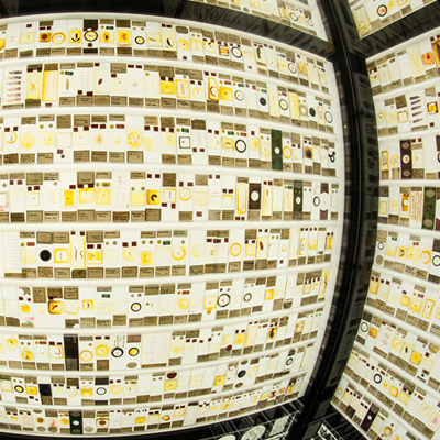 Close up of the Micrarium, consisting of a small space surrounded by backlit slides containing insect specimens