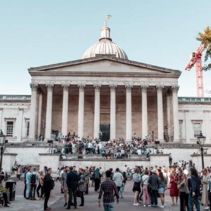 Colour photo of UCL main quad filled with people