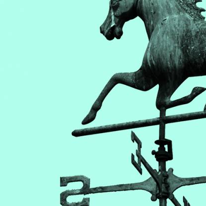 A horse weathervane in a blue wash of colour