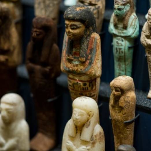Colour photo of human shaped shabti figures
