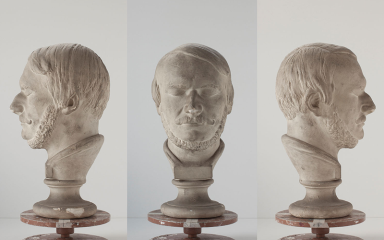 Front and side views of a plaster life mask